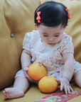 baby elsie wearing purebaby organic seaside romper organic cotton baby clothes chinese new year baby clothes