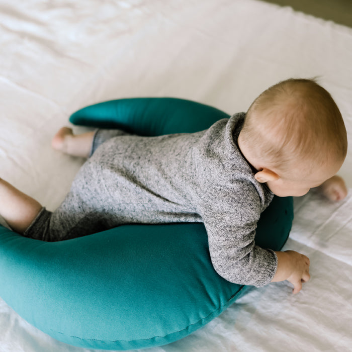 baby tummy time on snuggle me organic feeding support pillow